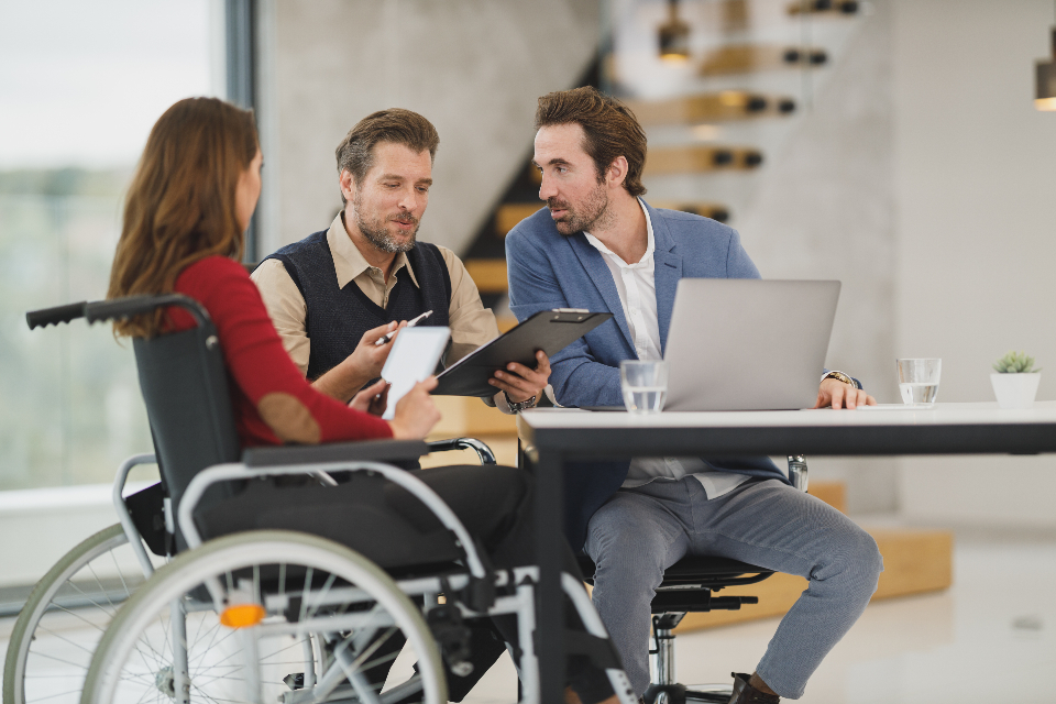 Diverse workplace team meeting reflecting an inclusive DEI strategy